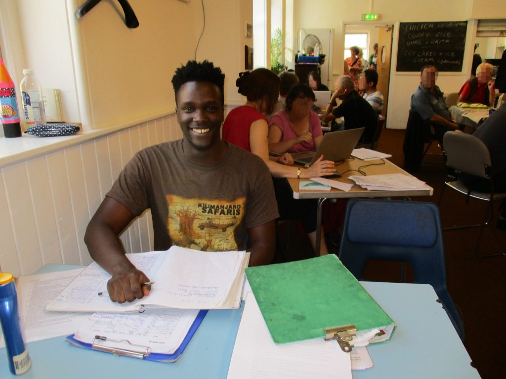 Volunteer Matthew on the Drop-in reception